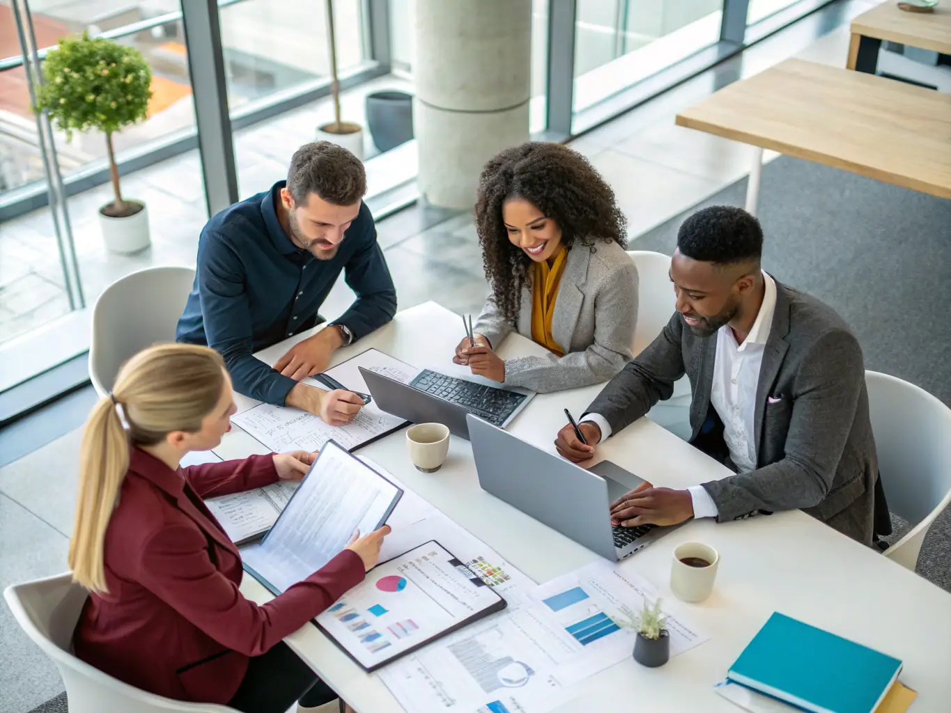 A diverse team of professionals collaborating around a table, discussing strategies to improve operational efficiency, set in a bright and modern office.